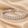 “Crystal Elegance” bracelet – 17 cm, crafted from high-quality material with silver plating. A refined intertwined design adorne